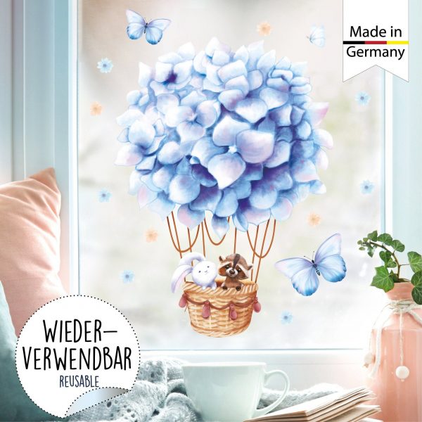 Auf dem Bild ist das Produkt: Fensterbild Frühling hellblauer Heißluftballon mit Waschbär und Hase Fensterdeko Kinderzimmer Kind, Frühlingsdeko zum Preis von €14.9 abgebildet.