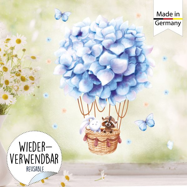 Auf dem Bild ist das Produkt: Fensterbild Frühling hellblauer Heißluftballon mit Waschbär und Hase Fensterdeko Kinderzimmer Kind, Frühlingsdeko zum Preis von €14.9 abgebildet.