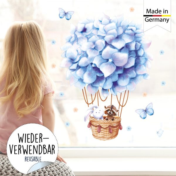 Auf dem Bild ist das Produkt: Fensterbild Frühling hellblauer Heißluftballon mit Waschbär und Hase Fensterdeko Kinderzimmer Kind, Frühlingsdeko zum Preis von €14.9 abgebildet.