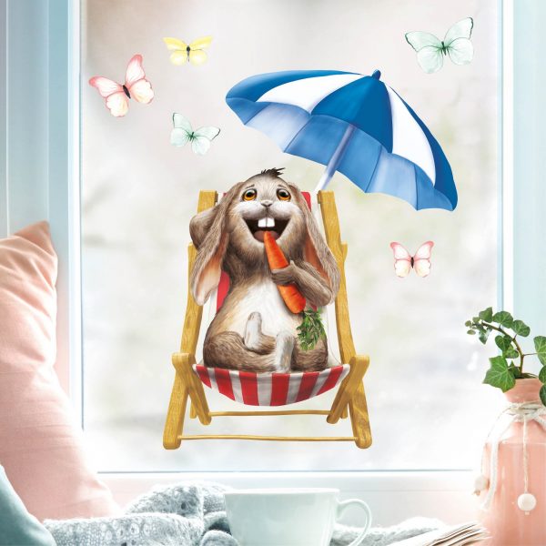 Auf dem Bild ist das Produkt: Fensterbild Frühling Wiederverwendbar Ostern Hase Liegestuhl Möhre Schmetterlinge Fensterdeko Kinder, Frühlingsdeko, Osterdeko zum Preis von €14.9 abgebildet.