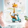 Wiederverwendbares Fensterbild Frühling Ostern Giraffe auf Motorroller, Fensterdeko Kinderzimmer Kind, Frühlingsdeko Auf dem Bild ist das Produkt: Wiederverwendbares Fensterbild Frühling Ostern Giraffe auf Motorroller, Fensterdeko Kinderzimmer Kind, Frühlingsdeko zum Preis von €14.9 abgebildet.