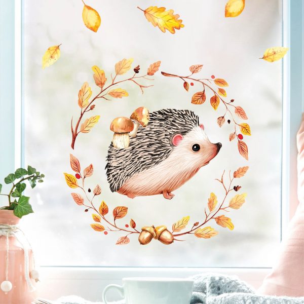 Auf dem Bild ist das Produkt: Fensterbild Herbst Igel mit Pilzen und Blätterkranz wiederverwendbare Fensteraufkleber Kinderzimmer zum Preis von €13.90 abgebildet.