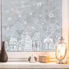 Auf dem Bild ist das Produkt: Wiederverwendbares Fensterbild Weihnachten Winterstadt Skyline zum Preis von €13.90 abgebildet.