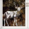 Auf dem Bild ist das Produkt: Wiederverwendbares Fensterbild weißer Hirsch Fensterdekoration Weihnachten Winter Fensterdeko zum Preis von €17.90 abgebildet.