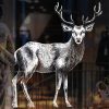 Auf dem Bild ist das Produkt: Wiederverwendbares Fensterbild weißer Hirsch Fensterdekoration Weihnachten Winter Fensterdeko zum Preis von €17.90 abgebildet.