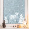 Auf dem Bild ist das Produkt: Wiederverwendbares Fensterbild weißer Hirsch Tannenbaum Schneeflocken Fensterdekoration Weihnachten Winter weiß zum Preis von €17.90 abgebildet.