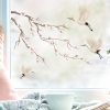 Auf dem Bild ist das Produkt: Fensterbild Frühling Magnolienzweig mit Kranichen bunt farbig wiederverwendbare Fensteraufkleber Kinderzimmer Baby Kind, Osterdeko zum Preis von €13.90 abgebildet.
