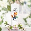 Auf dem Bild ist das Produkt: Kerze zur Einschulung Fuchs mit Buch personalisiert mit Namen und Datum anpassbares Geschenk zum Preis von €6.40 abgebildet.