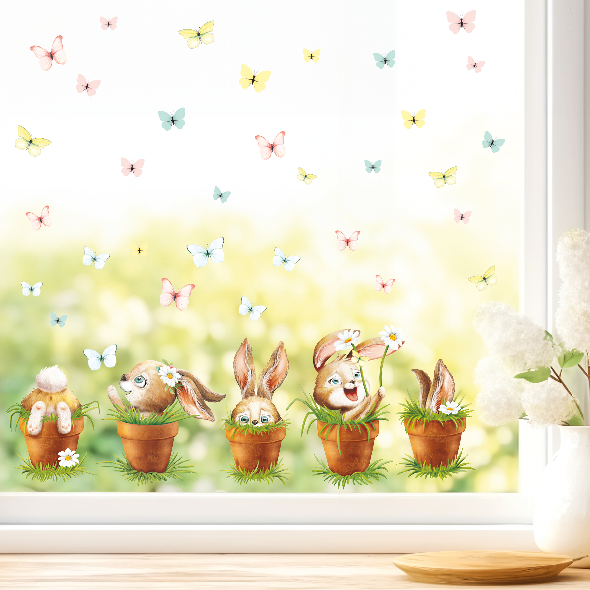 Auf dem Bild ist das Produkt: Fensterbild Frühling Ostern 5 Hasen im Blumentopf mit Schmetterlingen Fensterdeko Kinderzimmer Kind Frühlingsdeko zum Preis von €18.9 abgebildet.