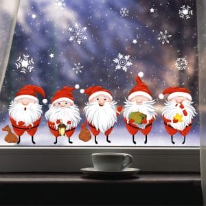 Auf dem Bild ist das Produkt: Fensterbild Weihnachtsmänner Wichtel 5 kleine Weihnachtwichtel Zwerge und Schneeflocken Fensteraufkleber wiederverwendbar zum Preis von €13.90 abgebildet.