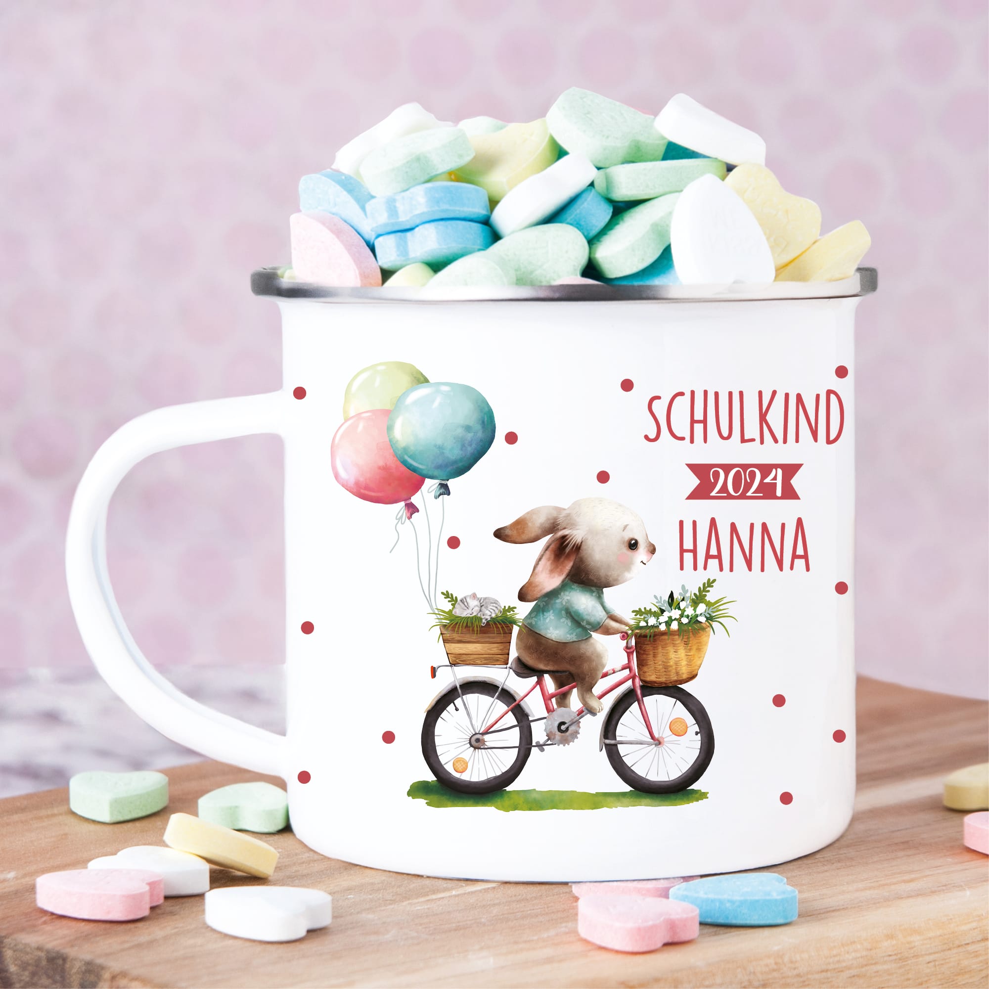 Auf dem Bild ist das Produkt: Kindertasse Emaille Becher Hase auf Fahrrad Schulkind personalisiertes Geschenk Einschulung Schulanfang Mädchen zum Preis von €18.90 abgebildet.