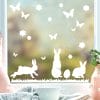 Fensteraufkleber Hasen mit Ostereiern und Schmetterlingen WIEDERVERWENDBAR Auf dem Bild ist das Produkt: Fensteraufkleber Hasen mit Ostereiern und Schmetterlingen WIEDERVERWENDBAR zum Preis von €12.90 abgebildet.