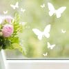 Auf dem Bild ist das Produkt: Fensteraufkleber Frühling Schmetterlinge weiß WIEDERVERWENDBAR zum Preis von €8.9 abgebildet.
