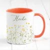 Tasse Wildblumen personalisiert farbig mit Wildblumen und dem Wunschnamen Natur Naturliebhaber Auf dem Bild ist das Produkt: Tasse Wildblumen personalisiert farbig mit Wildblumen und dem Wunschnamen Natur Naturliebhaber zum Preis von €17.90 abgebildet.
